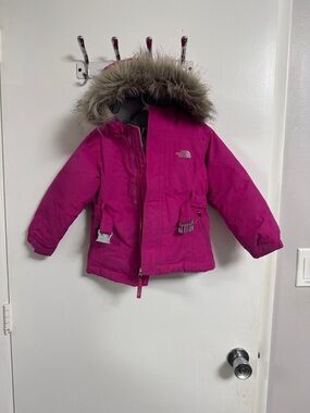 The North Face Kids Bright Pink Hooded Winter Jacket with Faux Fur Trim